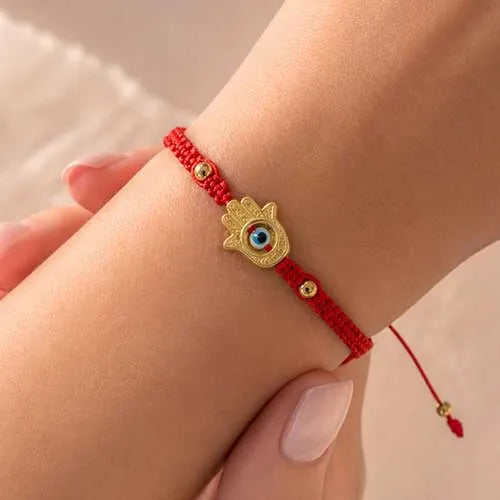 Pulsera tejida Hamsa hand with eye
