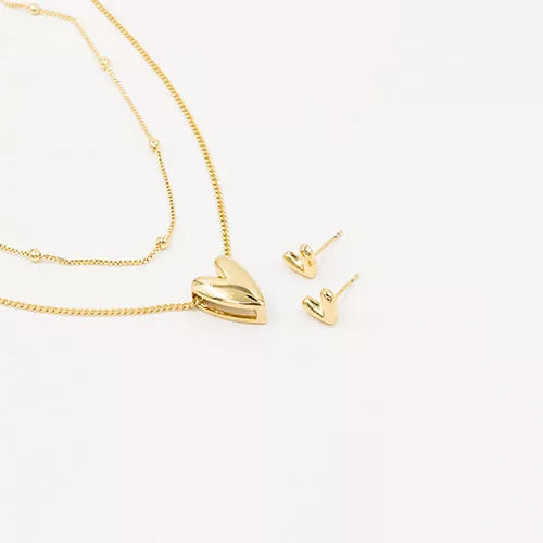 Juego en rodio elongated smooth heart
