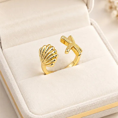 Anillo Concha y Estrella de Mar Ajustable con Baño de Rodio