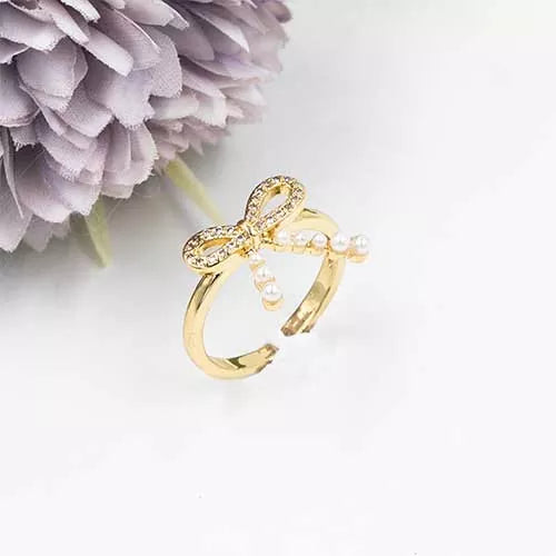 Anillo talla regulable bun with pearl ends