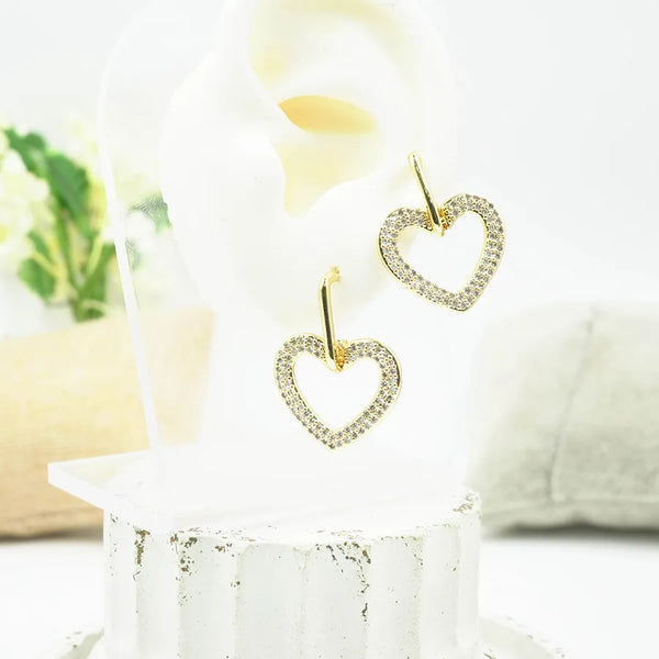 Par de candongas rounded heart zircons