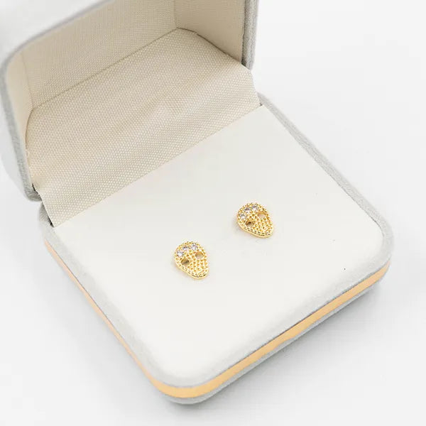 Par de topos calavera zircones