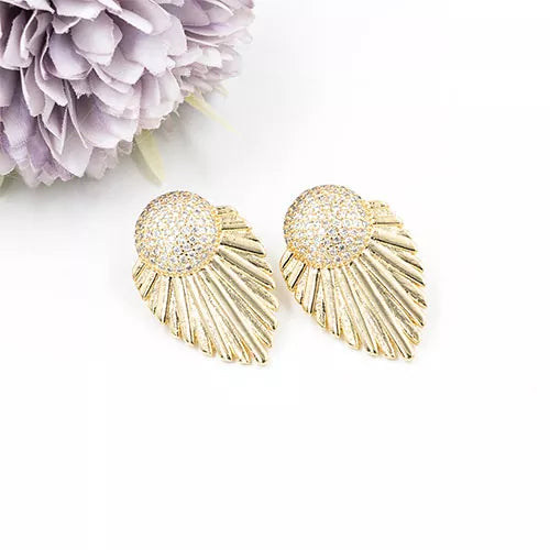 Par de topos en rodio round mole with zircon and cape