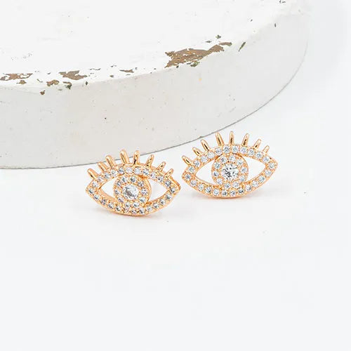 Par de topos eye surrounded by zircons