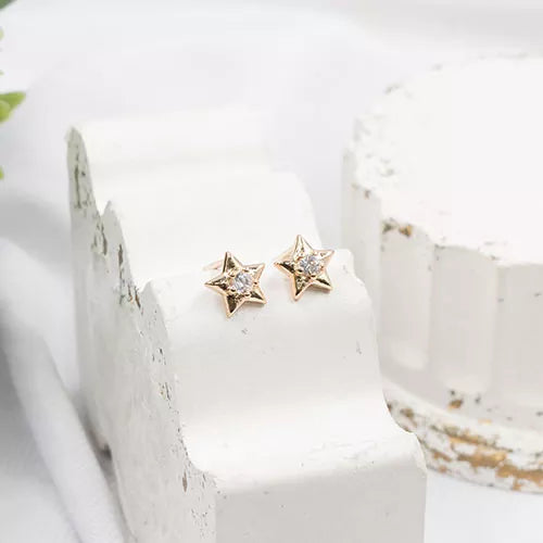 Par de topos mini en rodio small star with central zircon