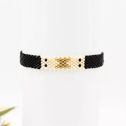 Pulsera Miyuki X en el centro