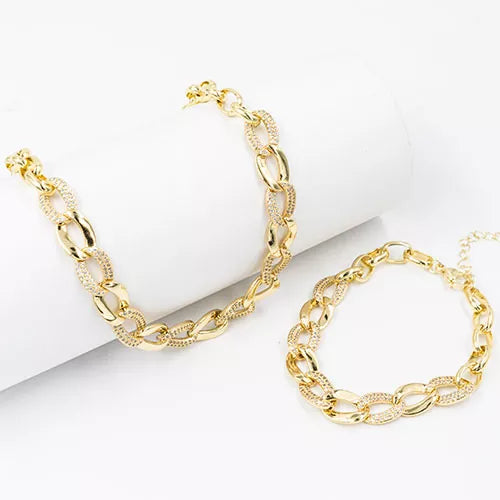 Set pulsera + cadena en rodio cross link